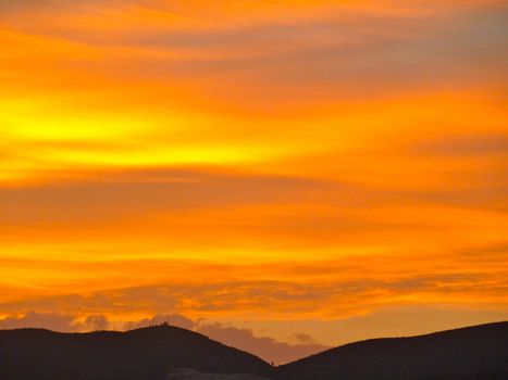 beautiful orange sunset over the mountains