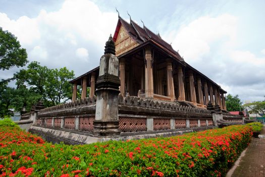 Buddhist temple with blue sky in Laos