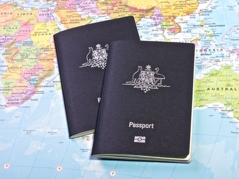 Australian Passport With the World map in the Background