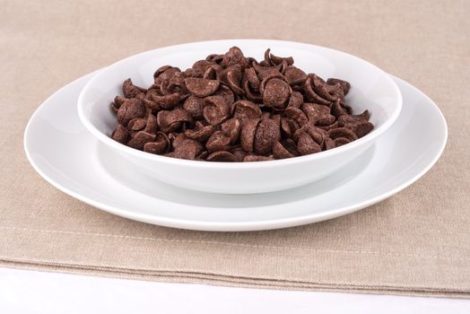 Dish with chocolate cereal flakes.