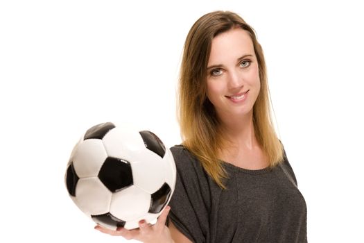 portrait of a woman holding a soccer ball on white background