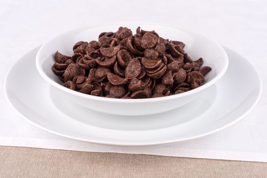 Dish with chocolate cereal flakes.