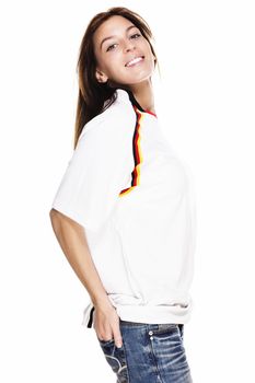 happy beautiful woman wearing football shirt with hand in her back pocket on white background