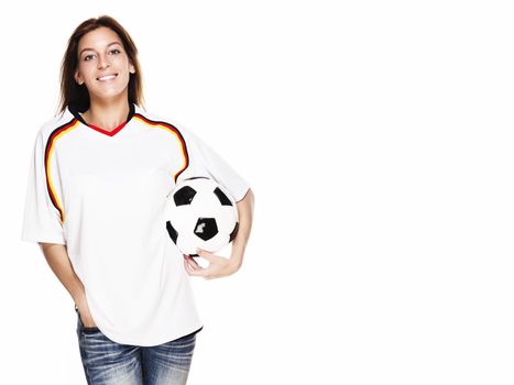 happy woman wearing football shirt holding football on white background