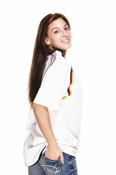 happy young woman wearing football shirt turning around on white background