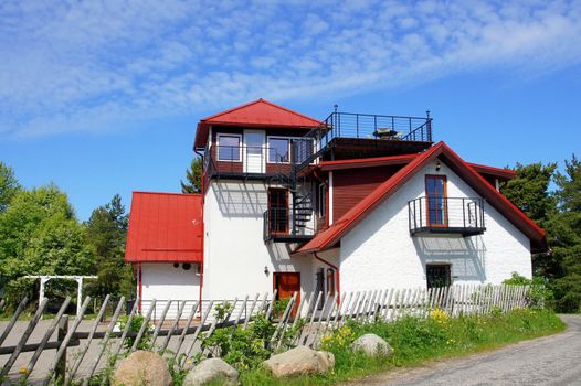 The white brick two-storeyed house