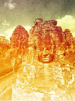 Faces carved into stones in Bayon temple in Angkor Cambodia