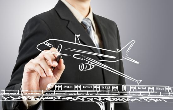 Business man draw train, plane  transportation and cityscape