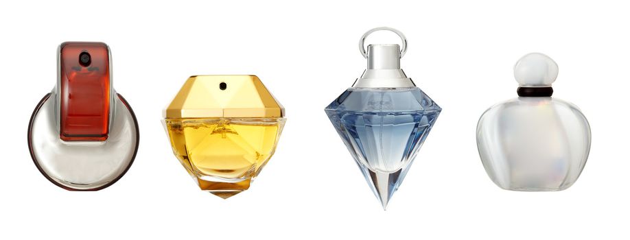 Studio photo of set of luxury perfume bottles. Isolated on white background