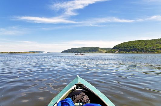 Bow of the boat and the landscape with blue sky. The Volga River. Samara.