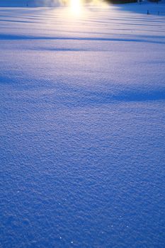 Details of a beautiful snow surface perfect for backgrounds on greeting cards etc.