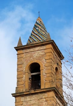 Church belfry with colorful conical roof in Piazza Armerina, Sicily, Italy