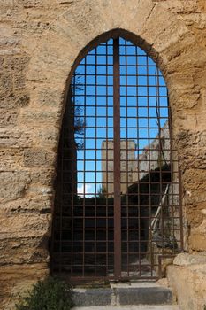 Barred gate of Castello di Lombardia medieval castle in Enna, Sicily, Italy