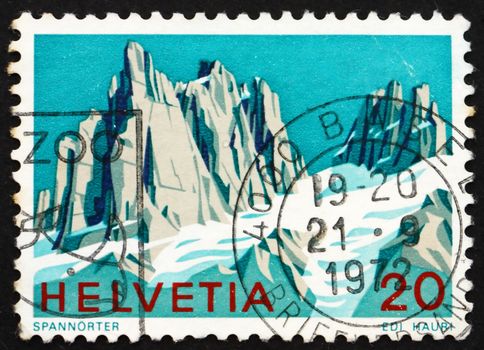 SWITZERLAND - CIRCA 1972: a stamp printed in the Switzerland shows View of Spannorter, Swiss Alps, circa 1972