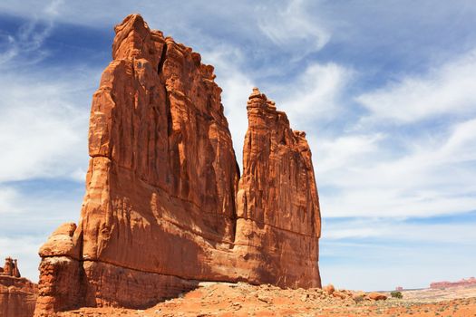 Courthouse Towers Ridge in Arches National Park with dramatic Blue Sky