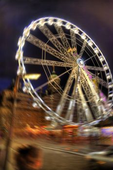 funfair scene in the old town of amsterdam, netherlands (hdr)