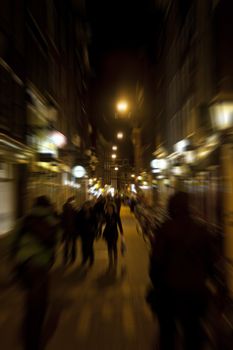scene in the old town of amsterdam, netherlands by night