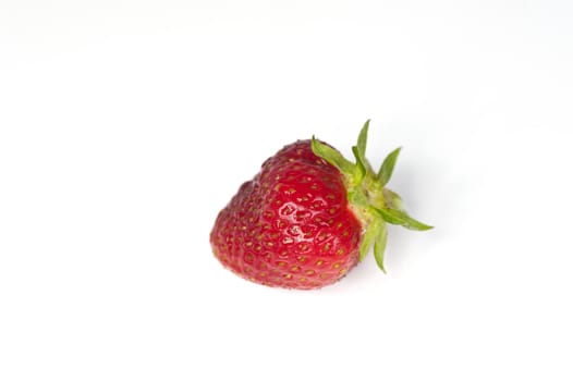 Closeup of a single strawberry on a white background