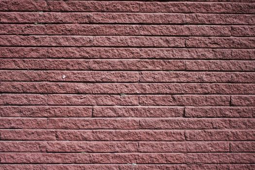 Ancient wall made from red brick.