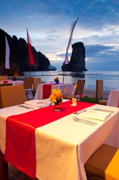 dinner on sunset at beach in Thailand