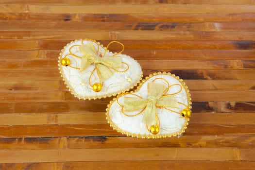 Heart shaped gift box on wood background