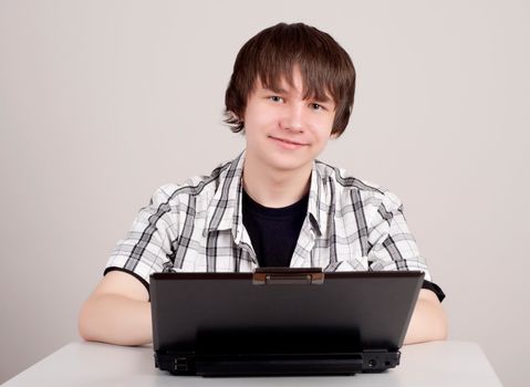 student bothered to learn, he sits at the table on which stands the computer