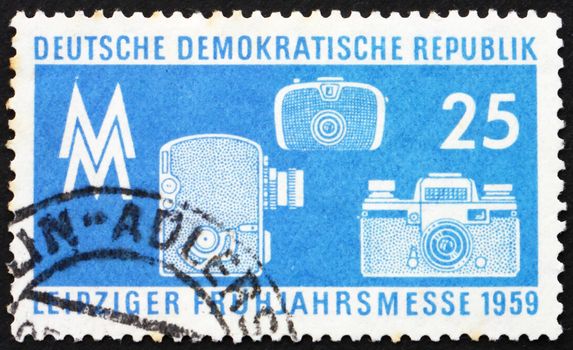 GDR - CIRCA 1959: a stamp printed in GDR shows Photographic Equipment, Leipzig Spring Fair, circa 1959