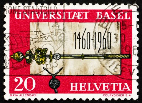 SWITZERLAND - CIRCA 1960: a stamp printed in the Switzerland shows Founding Charter and Scepter of University of Basel, 500th Anniversary, circa 1960