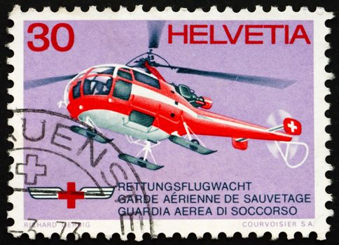 SWITZERLAND - CIRCA 1972: a stamp printed in the Switzerland shows Red Cross Rescue Helicopter, circa 1972