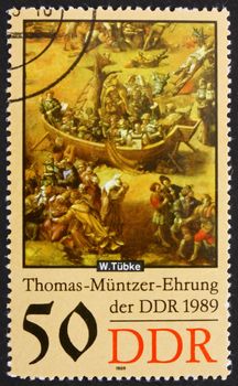 GDR - CIRCA 1989: a stamp printed in GDR shows Ark, Detail of the Painting Early Bourgeois Revolution in Germany in 1525 by Werner Tubke, circa 1989