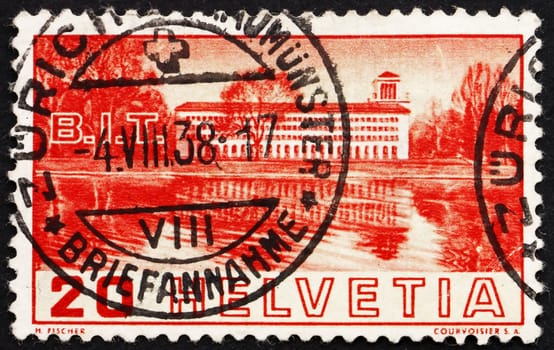 SWITZERLAND - CIRCA 1938: a stamp printed in the Switzerland shows View of Labor Building from Lake Geneva, Geneva, circa 1938