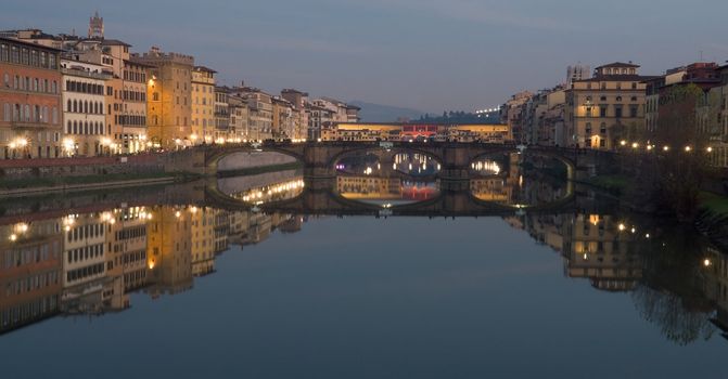 The banks of the Arno and the Ponte Vecchio in Florence on a winter evening