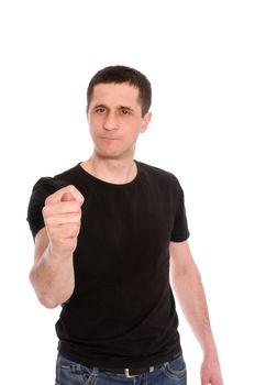 man in a black T-shirt showing a fig isolated on white background