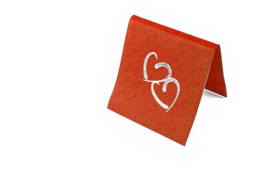 close up of card heart on white background