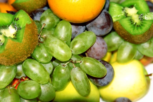 great number of juicy fruit on a white background