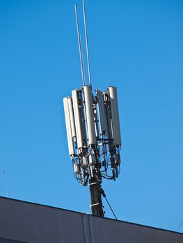 big antenna on the roof of building