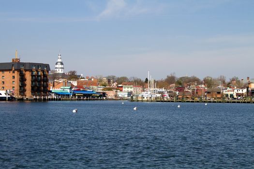 Skyline of the city of Annapolis, Maryland as seen from across the Severn River. State capitol dome is visible in the distance.