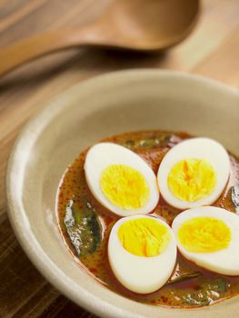 close up of a bowl of indian egg curry
