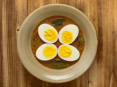 close up of a bowl of indian egg curry