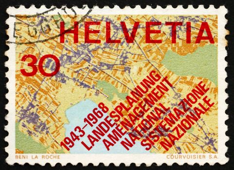 SWITZERLAND - CIRCA 1968: a stamp printed in the Switzerland shows Map Showing Systematic Planning, 25th Anniversary of the Swiss Society for Territorial Planning, circa 1968
