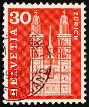 SWITZERLAND - CIRCA 1960: a stamp printed in the Switzerland shows Grossmunster Church, Zurich, circa 1960
