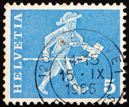 SWITZERLAND - CIRCA 1960: a stamp printed in the Switzerland shows Messenger, Fribourg, circa 1960
