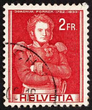 SWITZERLAND - CIRCA 1941: a stamp printed in the Switzerland shows Colonel Joachim Forrer of New St. Johann, Swiss Commander, Painting by Felix M. Diogg, circa 1941