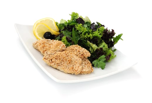 Chicken fillet in sesame mixture with lettuce on a white background