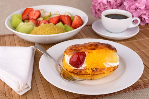 Strawberry cake and fruits in the morning.