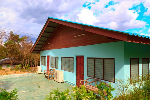 Traditional style house under blue sky.