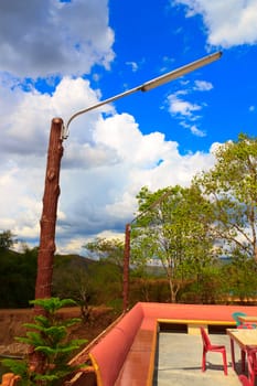 Light pole in garden with a old design.