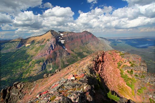 Mountaintop view of rugged alpine scenery in Glacier National Park.