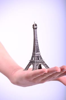 miniature Eiffel Tower is set to hand