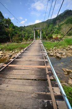 wood bridge to the jungle national park Thailand